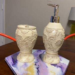 Nice soap/lotion dispenser and toothbrush holder